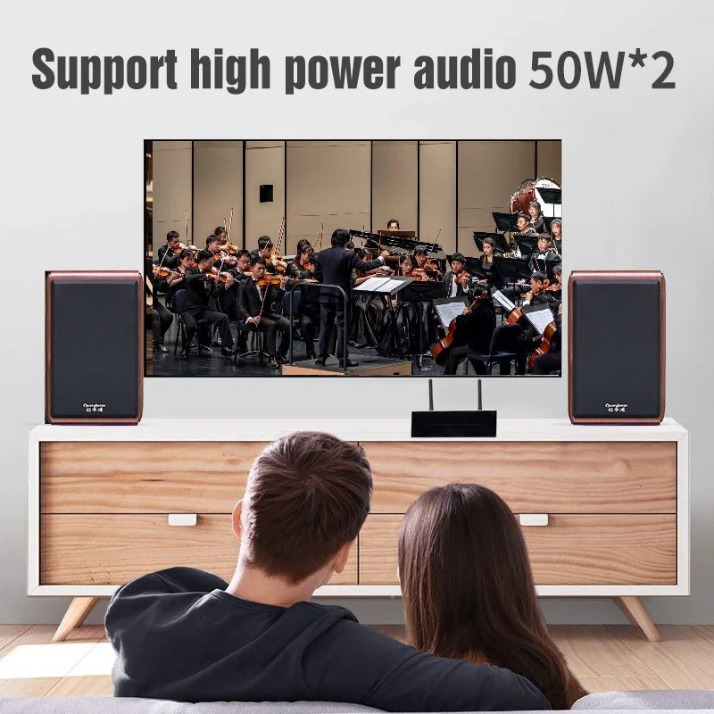 Pair of rose gold-finished bookshelf speakers with black fronts designed for wireless multiroom streaming amplifier home use