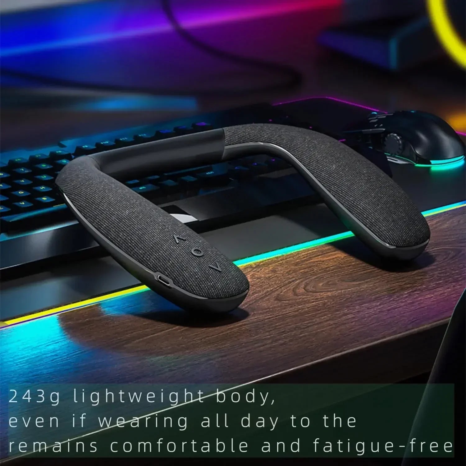 Black fabric wireless neckband speaker with sleek ergonomic design, subtle control buttons, and type-c quick charging