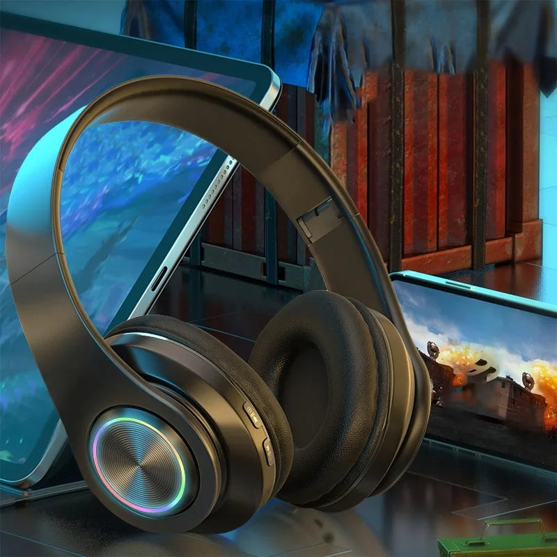 Black wireless over ear headphones with active noise canceling, canceling deep bass, rgb lighting, and portable folding design