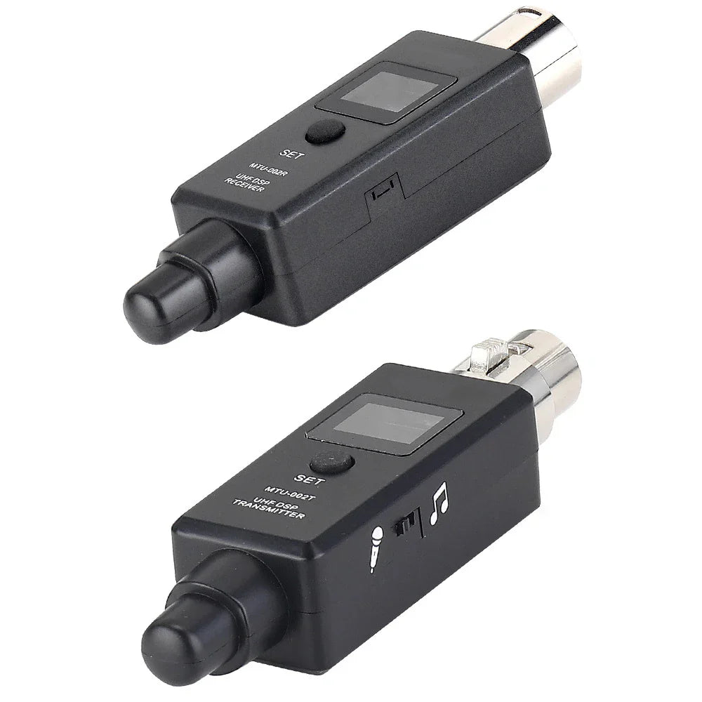 Black plastic wireless system with silver xlr capacitive microphone transmitter receiver handheld devices and digital displays