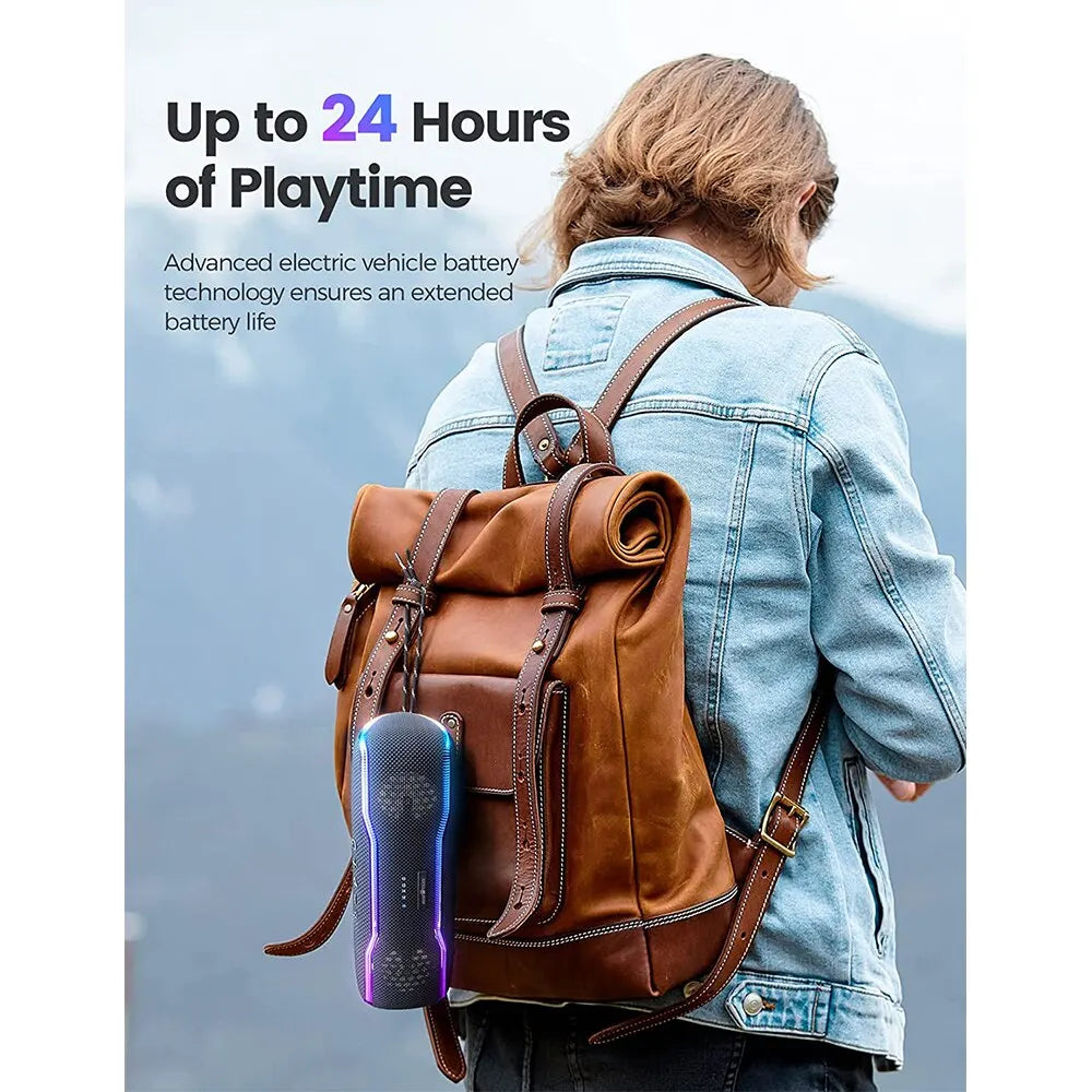 Blue textured wisetiger f10c ipx7 waterproof portable speaker hanging from brown leather backpack strap with fast charger compatibility