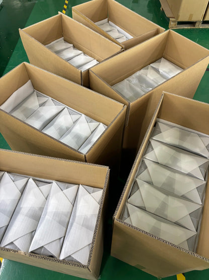White geometrically folded paper packaging inside open cardboard boxes for luxury jewelry set voice photo video gift