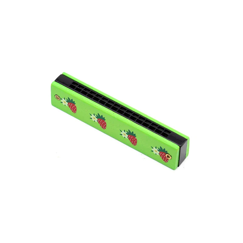 Bright green plastic harmonica toy with red strawberry and white flower decals for early music education