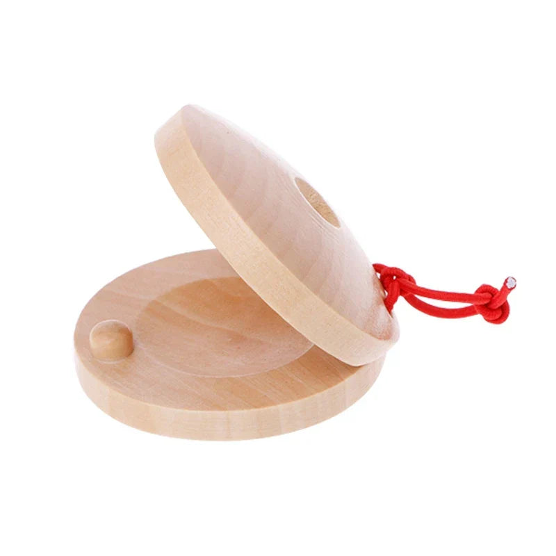 Light-colored wooden castanets wood percussion flamenco musical instrument kids with red string for easy handling