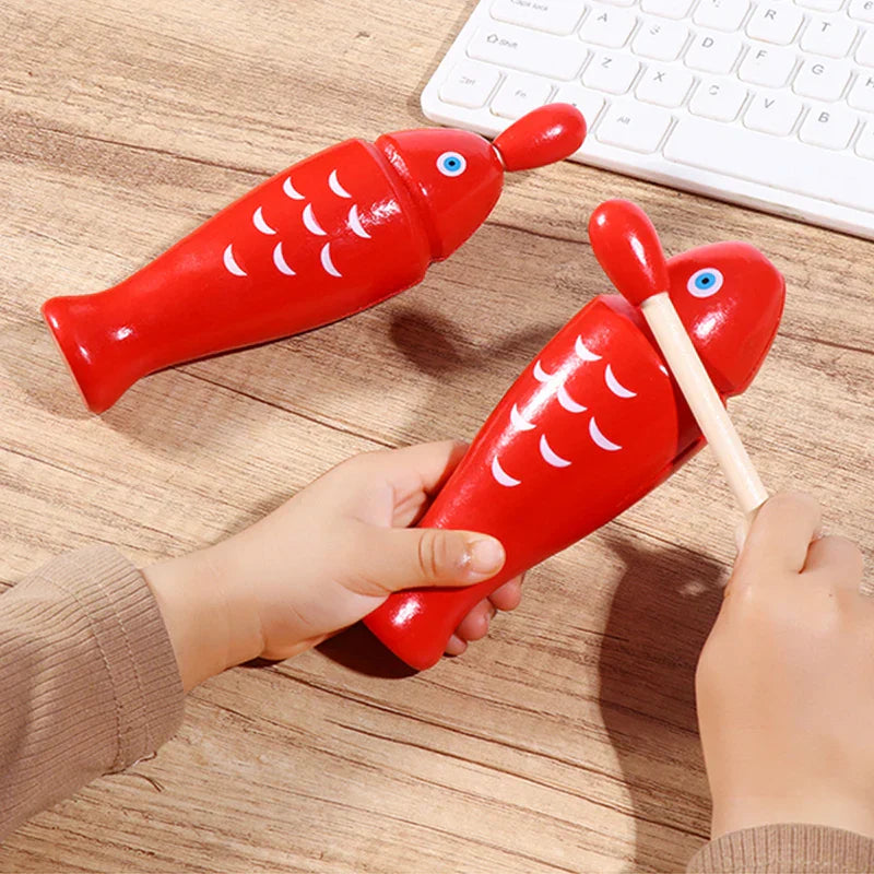 Red wooden fish orff percussion instrument with white scale patterns and blue eyes two tone woodblocker for beginners