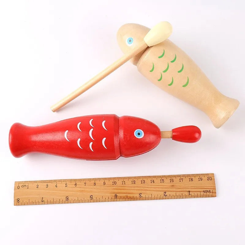 Red wooden fish orff percussion instrument with white scale patterns and blue eyes two tone woodblocker for beginners