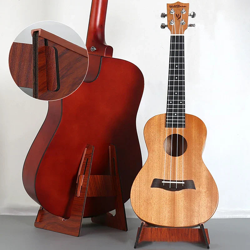 A polished reddish brown wooden guitar stand with a minimalist design for ukulele mandolin bass floor display holder