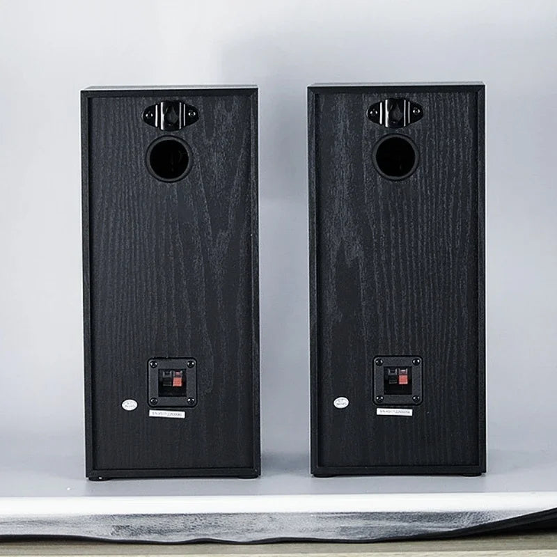Black wood-grain finished bookshelf passive speakers with circular ports and terminal connectors for subwoofer home theater use