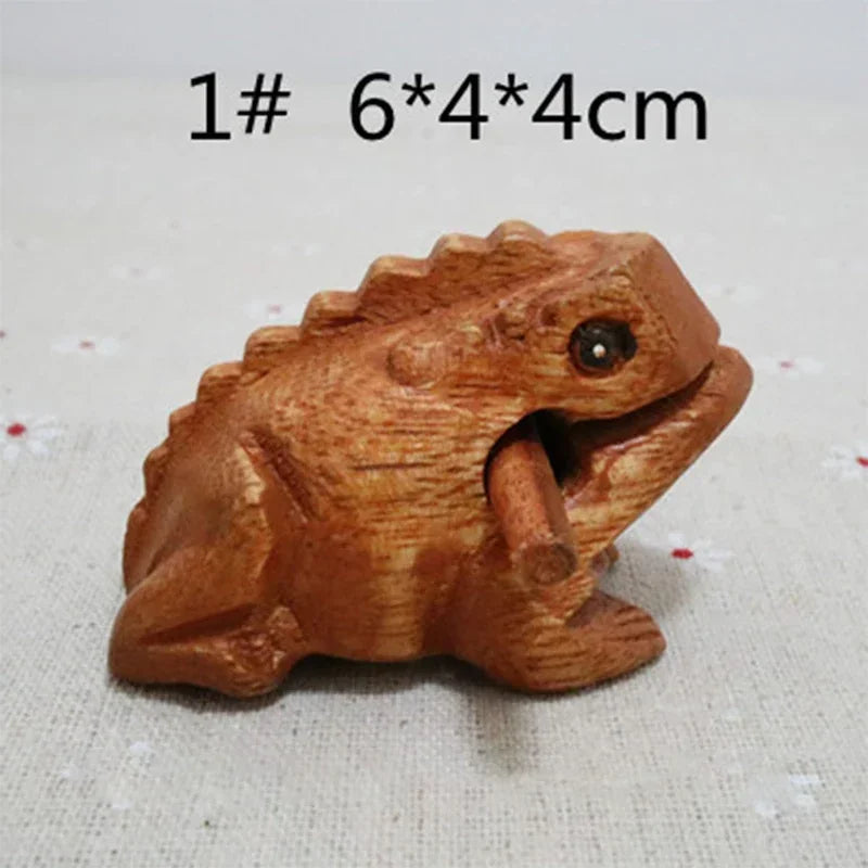 Hand-carved wooden lucky frog with smooth warm brown finish and detailed texture croaking musical instrument decor