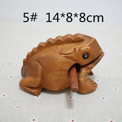 Hand carved wooden lucky frog percussion instrument with warm brown finish and detailed sculpted features for decor or play
