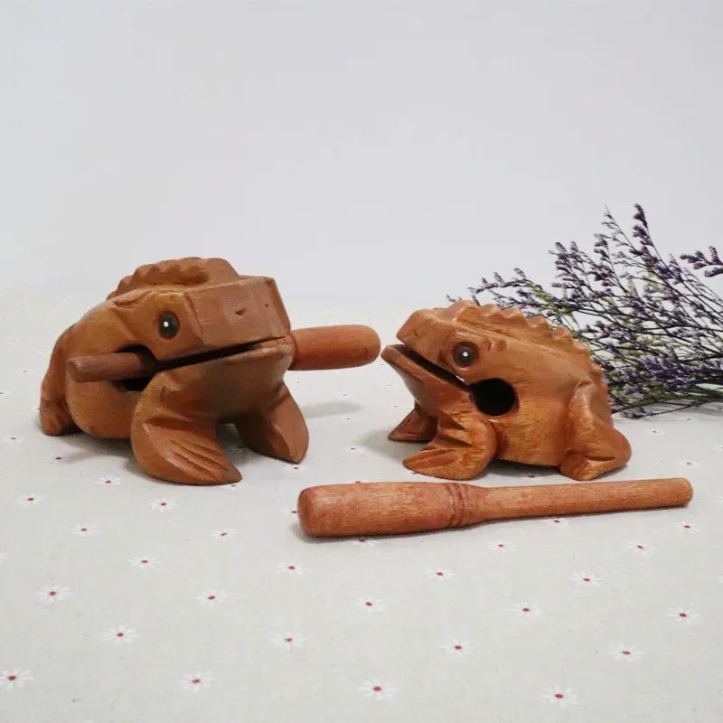 Hand-carved wooden lucky frog with natural finish and black bead eyes croaking musical instrument and fengshui decor