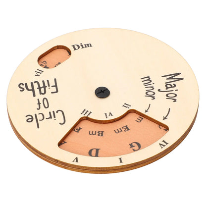Light-colored wooden melody tool circle of fifths wheel with engraved chords and roman numerals for musicians