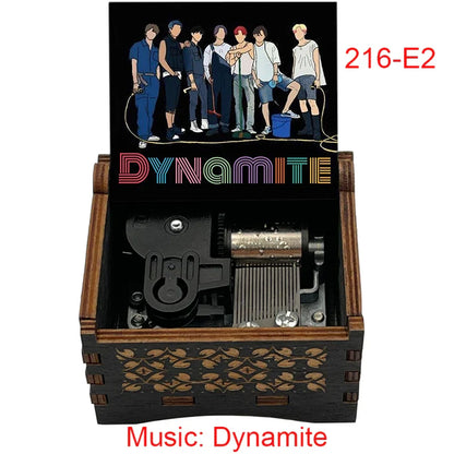 Wooden music dynamite mechanical music box with black and gold leaf exterior featuring bts rainbow lettering for friends home decoration