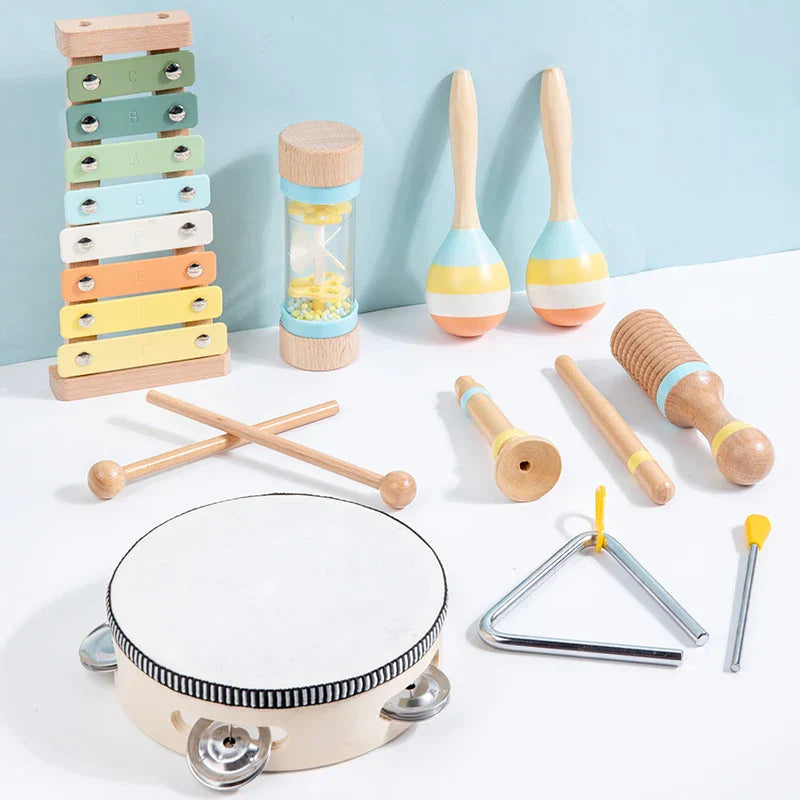 Beige wooden tambourine with white drumhead and silver jingles musical instrument montessori percussion instrument toy
