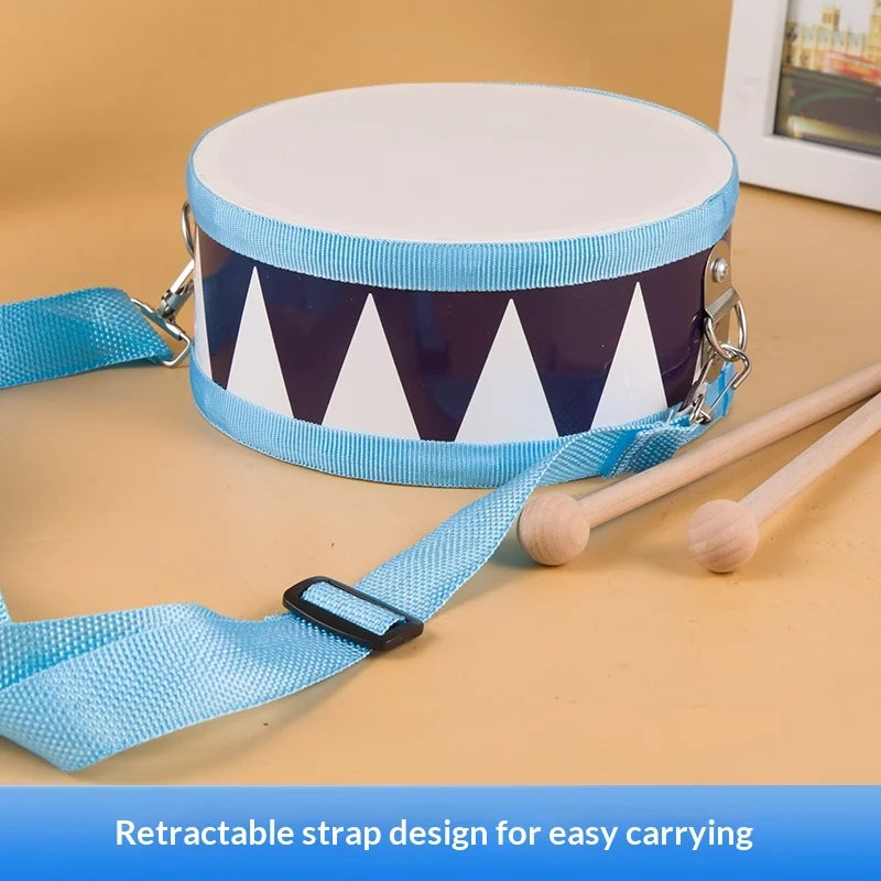 Wooden blue and white triangular-patterned percussion drum toy with retractable strap for toddlers rhythmic play