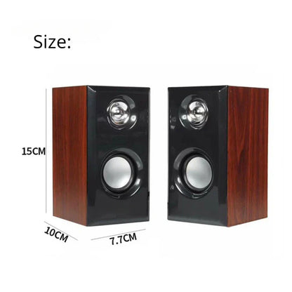 A pair of wooden wired loudspeakers with glossy black front and wood grain sides featuring two circular drivers for computer use