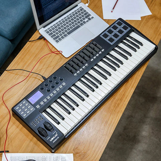 Black and white 61-key midi keyboard controller with digital display knobs buttons and pads for music teaching on win macos cross-platform