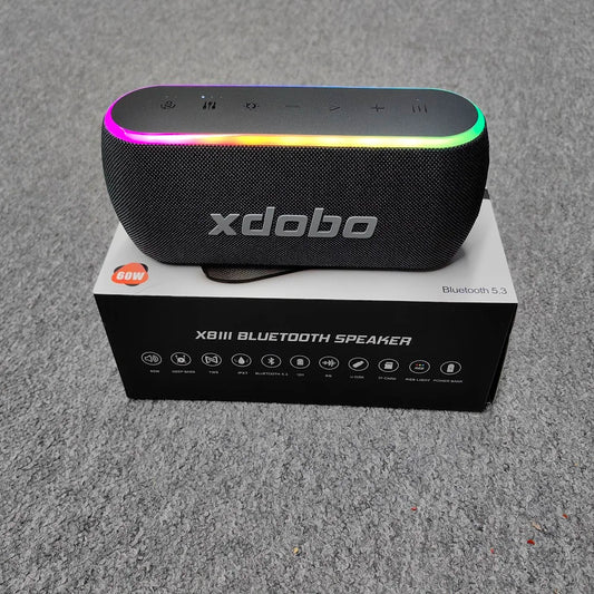 Black textured xdobo x8 iii speaker wireless subwoofer with colorful rgb light ring and bass power bank for outdoor use