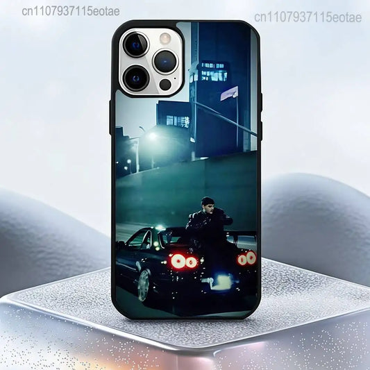 Black protective magnetic case for iphone pro max plus featuring rapper lyfestyle sitting on sports car at night