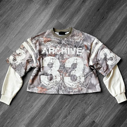 A cropped long-sleeved camouflage sweatshirt with white archive 33 lettering, casual hip hop y2k style pullover for men