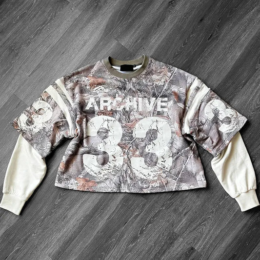 A cropped long-sleeved camouflage print sweatshirt with white archive 33 lettering for hip hop casual wear