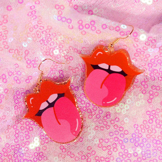 Vibrant red and pink y2k earrings with tongue-shaped cute flame snake design and gold-toned hooks for hip hop style