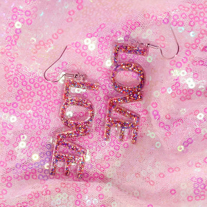 Pink glittery love letter y2k earrings with clear resin backing and silver hooks for cute flame snake lightning queen alien set