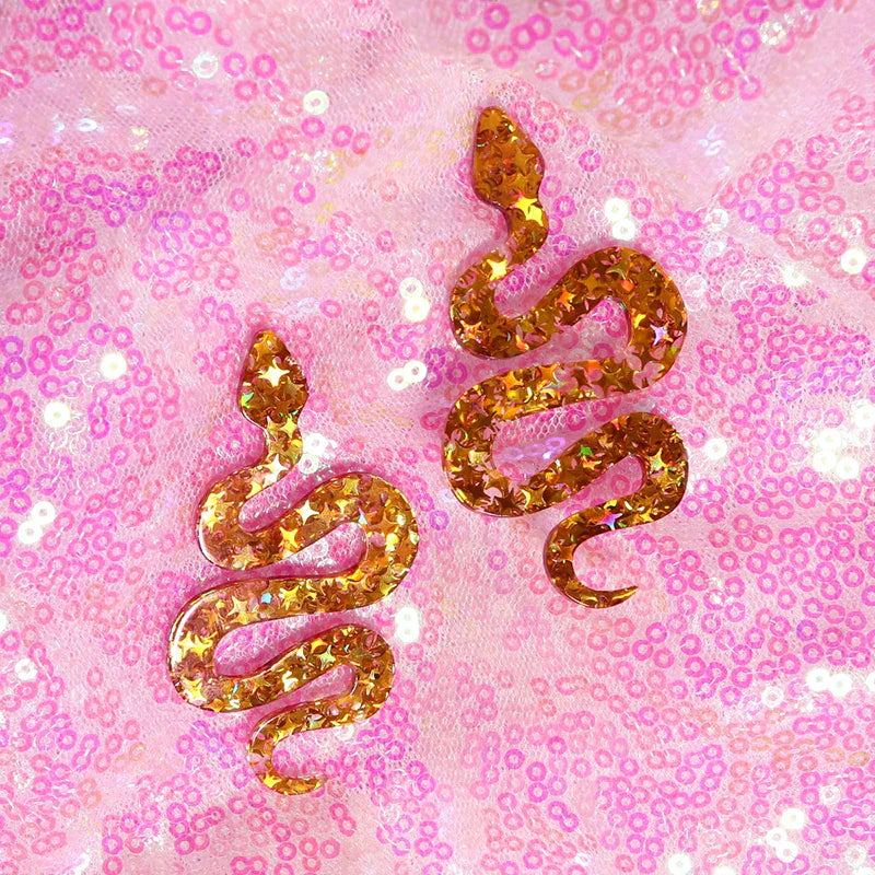 Golden glittery y2k earrings shaped like cute flame snake with shiny starry texture for lightning queen alien style
