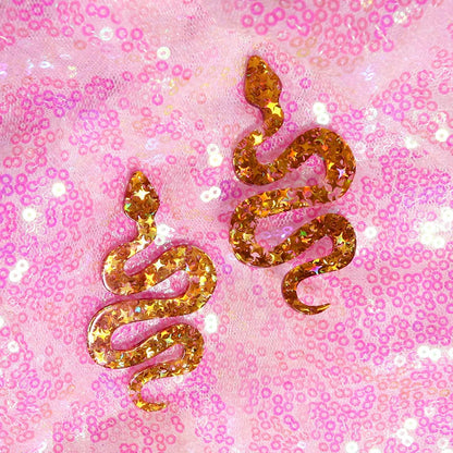 Golden glittery y2k earrings shaped like cute flame snake with shiny starry texture for lightning queen alien style