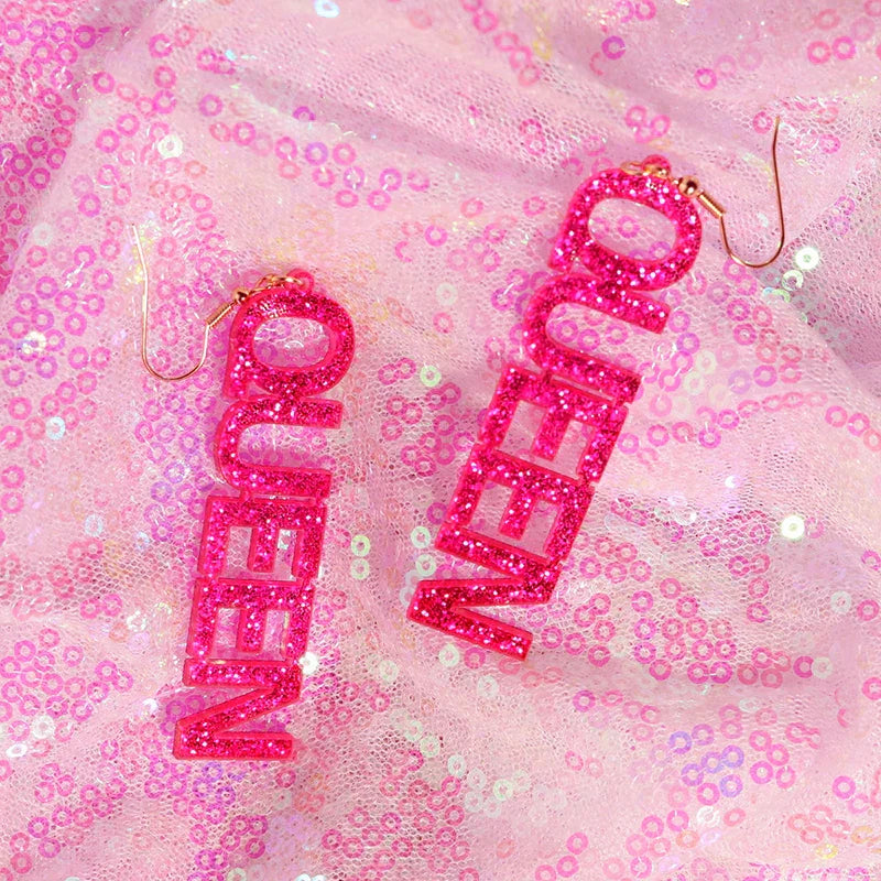Vibrant pink glittery queen letter drop y2k earrings with gold-toned hooks from cute flame snake lightning queen alien set