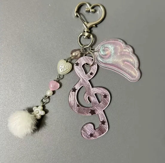 Pink metallic y2k harajuku musical treble clef keychain with star details heart pendant and korean trendy chain charm