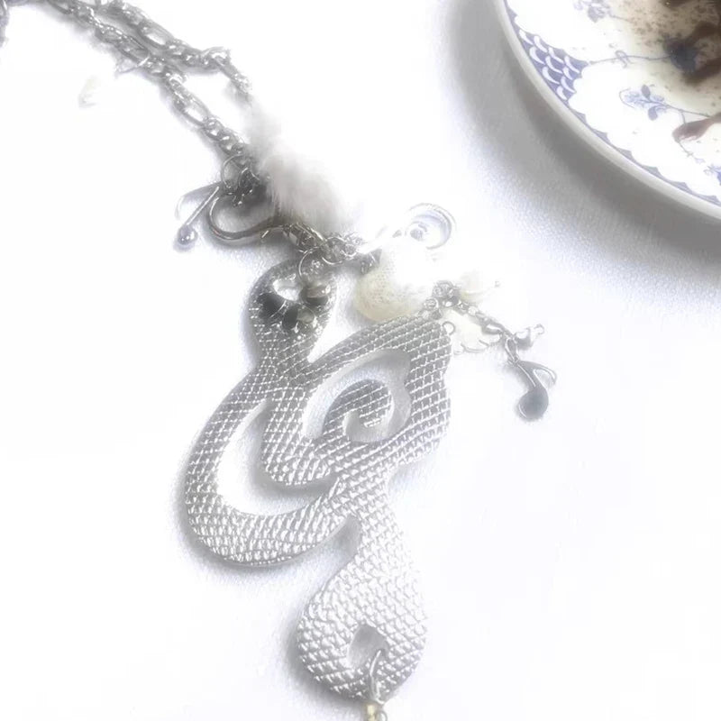 Silver metallic necklace featuring textured treble clef pendant with music note charms pearl accents women harajuku kawaii jewelry musical notes korean fashion chain
