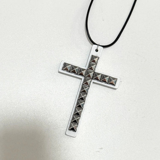 White cross pendant with silver-toned pyramid studs on black cord y2k jewelry wooden cross rivet hip hop grunge necklace