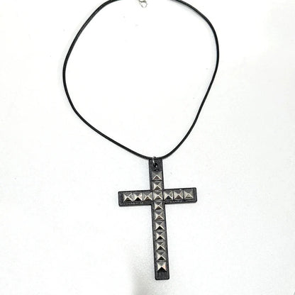 Black studded wooden cross rivet pendant necklace on black cord y2k jewelry for hip hop grunge style
