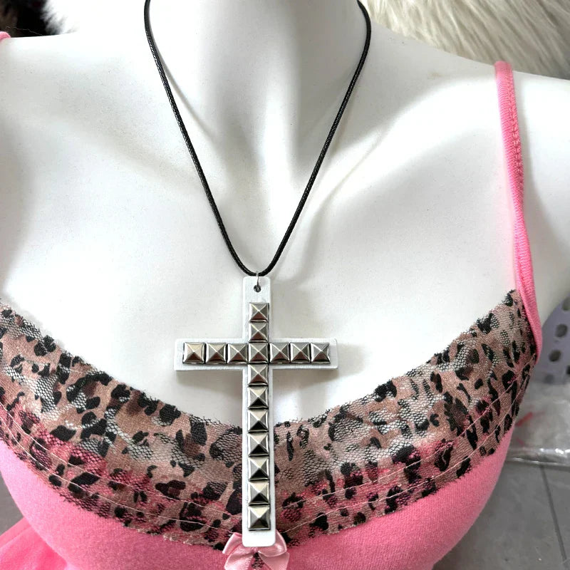 Studded silver cross necklace with black cord featuring wooden cross rivet design for y2k jewelry hip hop grunge style