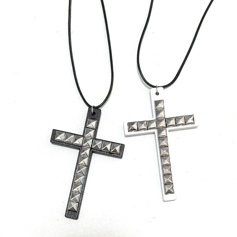 Two y2k jewelry wooden cross rivet necklaces in black and white with metallic pyramid studs for hip hop grunge style
