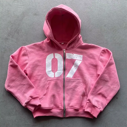 Pink zip-up hoodie with a white 07 graphic across the chest from y2k new streetwear baggy casual set