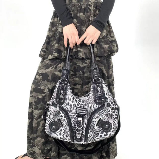 Black and white leopard print y2k vintage hot girl personality handbag with black leather accents and compartments maillard crossbody