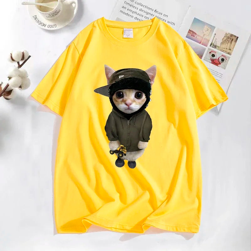 Bright yellow cotton yeat kitty tonka t shirt with funny cute cat graphic holding miniature toy truck in hoodie and cap
