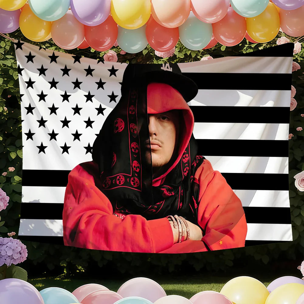 Black and red hoodie with skull pattern hanging on yeat singer a dangerous lyfe flag showcasing color difference for decor