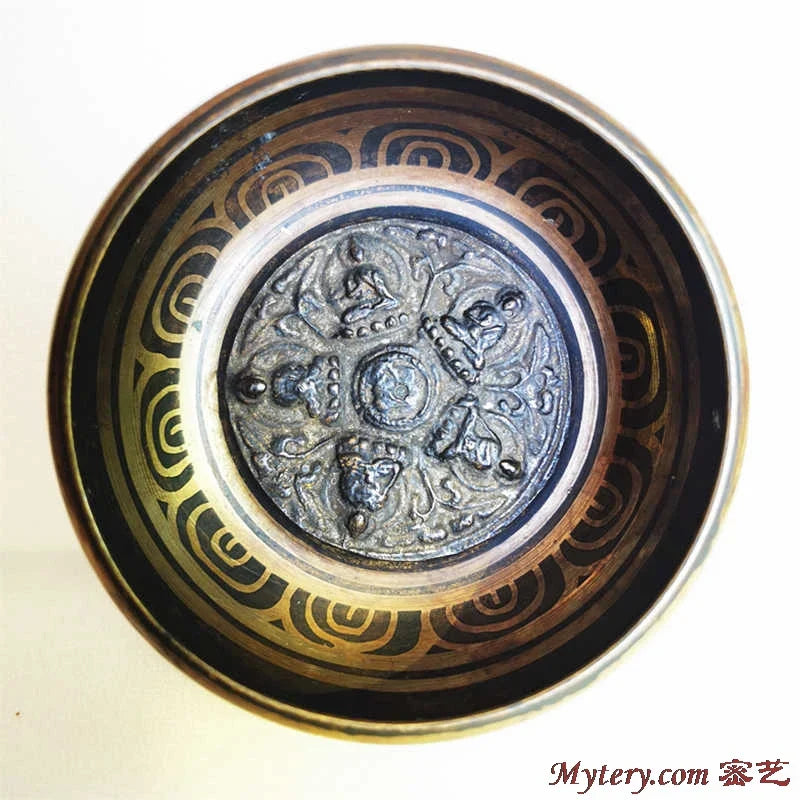A dark bronze brass tibetan singing bowl five with intricate engraved designs for yoga healing meditation musical instruments tibetan