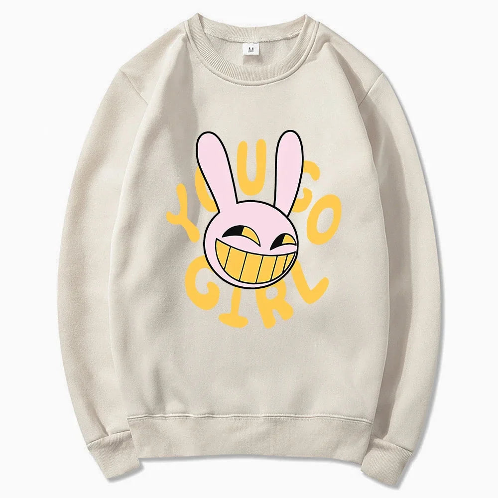 Beige crewneck sweatshirt featuring a pink cartoon bunny and bold yellow yugo girl lettering for fashion women harajuku digital circus jax rabbit hoodie unisex