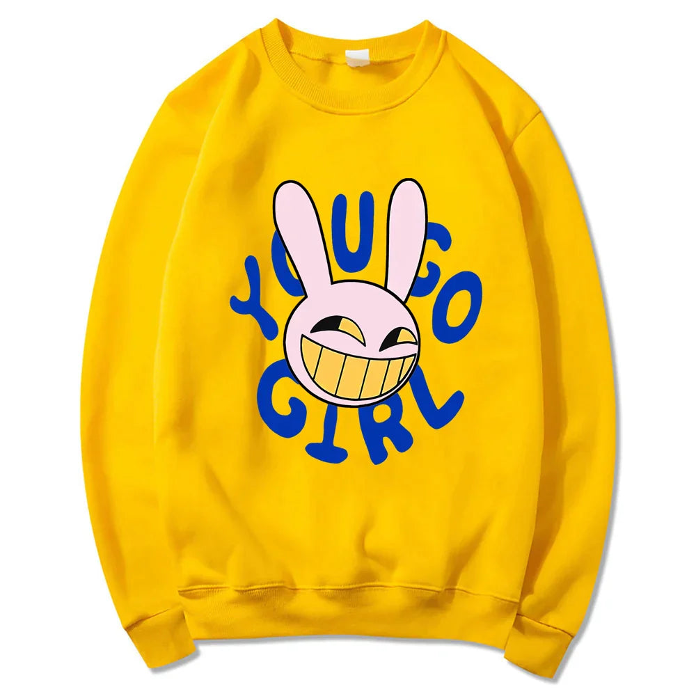 Bright yellow crewneck sweatshirt with cartoon bunny and bold blue yugo girl text digital circus jax rabbit hoodie unisex