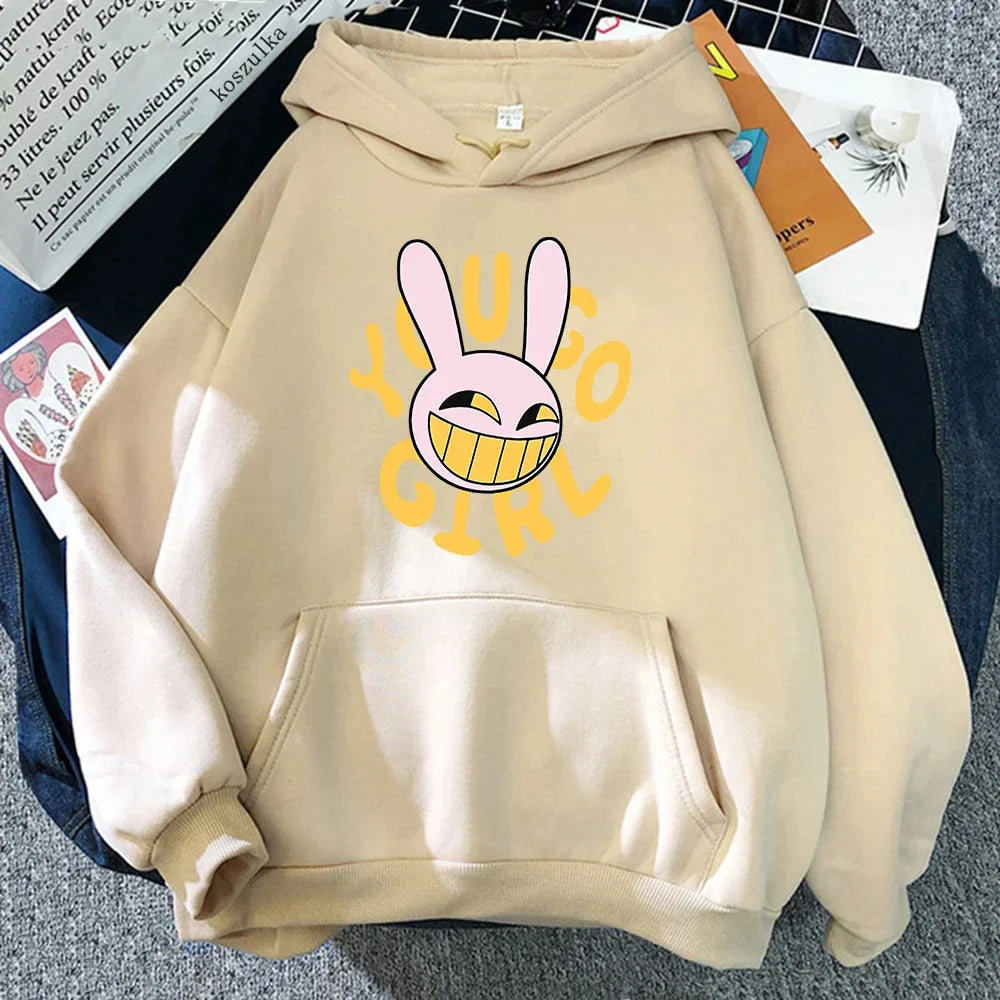 Beige digital circus jax hoodie featuring a pink cartoon bunny with yellow eyes and you go girl text for fashion women harajuku and rabbit hoodie unisex