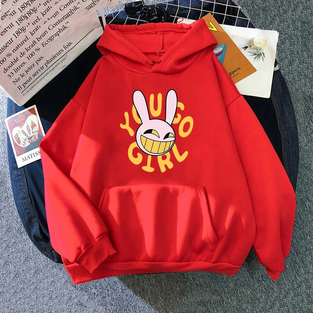 A vibrant red digital circus jax unisex rabbit hoodie featuring a cartoon bunny and bold yellow yuugo girl lettering