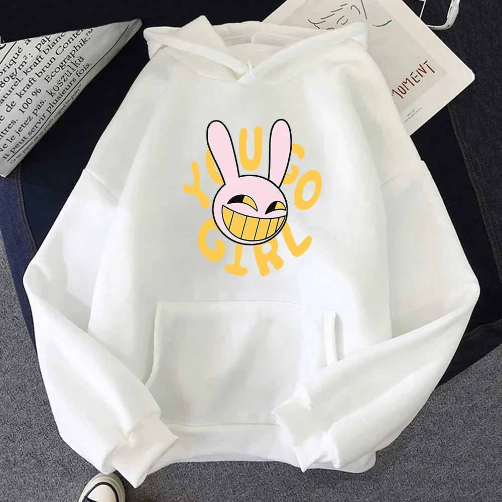 White digital circus jax hoodie featuring pink cartoon bunny with yellow teeth and bold yellow young girl text for fashion women harajuku and rabbit hoodie unisex