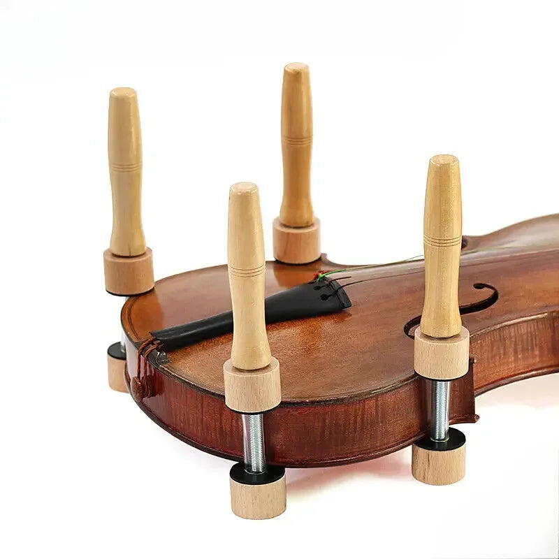 Wooden closure jig violin stand with light-colored handles and metal adjustment screws for jig violin making and production