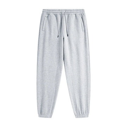 Light gray heathered zodf trendy men 345gsm fleece sweatpant with elastic waistband and tapered ribbed cuffs ideal for retro hip hop style