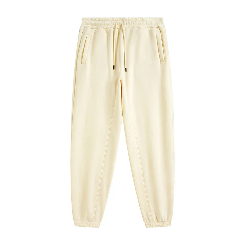 Cream-colored zodf trendy men 345gsm fleece sweatpant with drawstring waistband and side pockets in retro hip hop style