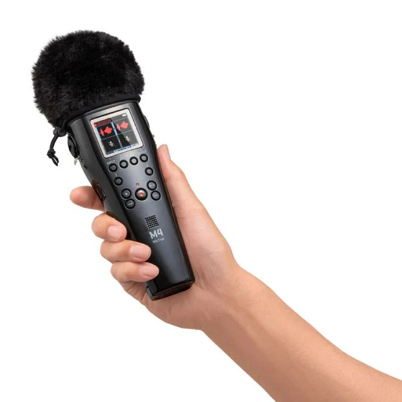 Black handheld zoom m4 portable digital recorder with fuzzy windscreen lcd screen showing float recording waveforms and timecode generator